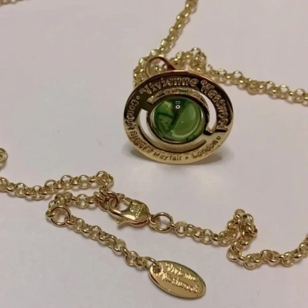 NIB Vivienne Westwood gold petite Saturn orb green crystal chain necklace